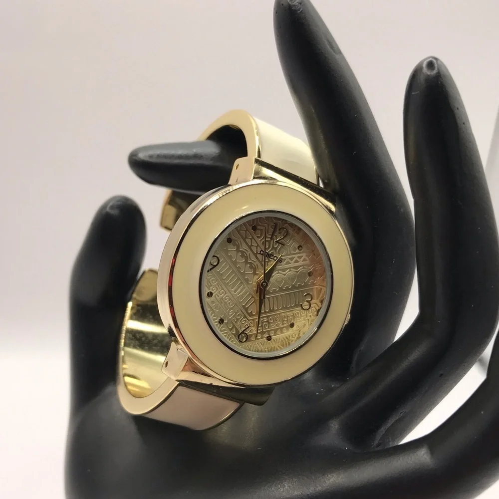 Chico’s Gold-Tone & Cream Hinged Cuff Watch